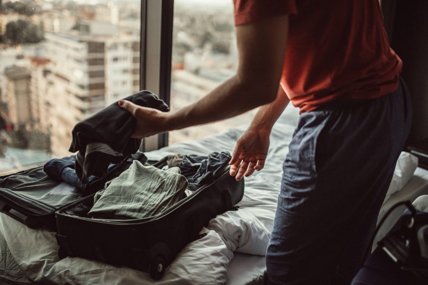 Man packing a suitcase